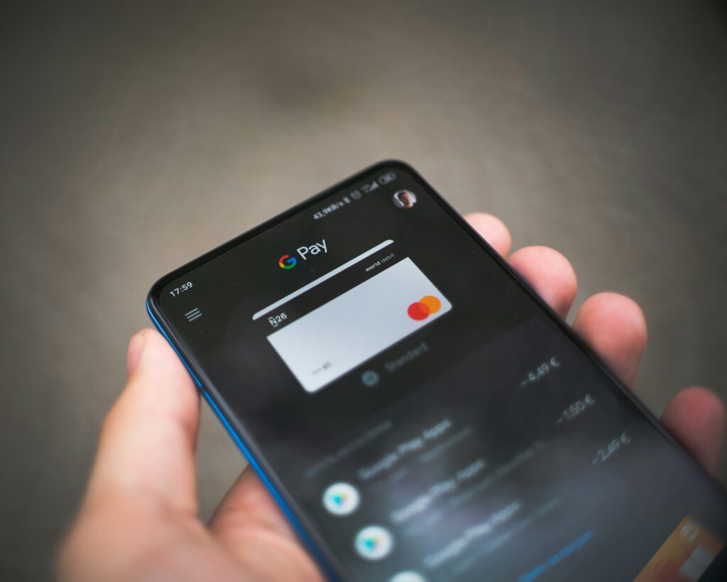 What Small Digital Payments Reveal About User Experience Image soure: Unsplash Think about the steps involved in making a small purchase online. A user may need to create an account, enter personal details, select a payment method, complete verification and wait for confirmation. Each step may serve a legitimate purpose, but together they can make a modest transaction feel unexpectedly complicated. That makes low-value payment flows an interesting subject for user-interface designers. They offer a compact way to examine how clearly a website presents prices, terms, forms and transaction feedback. The monetary amount may be small, but the interface still needs to explain exactly what the user is authorising. A good checkout does not simply remove as many screens as possible. It balances convenience with security, transparency and the information required to complete the transaction correctly. The Interface Should Match the Task Digital payments appear in many types of products. App stores process software purchases, streaming platforms collect subscription fees and transport apps charge for individual journeys. Other services sell digital content, event tickets, game items or temporary access to premium features. These transactions do not all require identical information. A physical order needs a delivery address, while a digital download usually does not. A recurring subscription must explain its billing schedule, whereas a one-time purchase needs a clear final total. Problems arise when a standard checkout is copied from one service to another without considering those differences. A form can then request information that has no obvious connection to the purchase. Even when the data is genuinely required, the absence of an explanation may leave users wondering why they are being asked for it. The better design question is therefore not merely “How short can this form be?” It is “What does the user need to understand and provide at this stage?” Budget Filters Need Supporting Information Price is one of the most visible ways to organise online products. Retail websites allow shoppers to set minimum and maximum amounts, while subscription platforms commonly separate plans by monthly cost. Specialist comparison pages can use the same principle. A page about a 10 euro deposit casino, for example, groups a particular category of entertainment platforms around a stated deposit threshold. This is one narrowly defined use of price-based filtering rather than the subject of digital payments as a whole. A monetary threshold can make a large selection easier to navigate, but it does not provide a complete assessment of a service. Users may still need information about transaction fees, recurring charges, account requirements and the conditions attached to payments. The same applies outside entertainment. A software plan advertised below €10 may be billed monthly or annually. A low-priced product may carry delivery charges. A free trial may convert into a paid subscription after a specified period. An interface should display these distinctions before the user reaches the final confirmation. Clear Labels Reduce Guesswork Checkout screens need language that describes what will happen next. A button labelled “Continue” does not reveal whether it opens another screen or completes a purchase. More specific text, such as “Review order” or “Pay now,” gives the user additional information about the consequence of pressing it. The total price should also remain visible. If taxes, service charges or delivery costs apply, displaying them only at the final moment can change the user’s understanding of the transaction. Forms benefit from the same clarity. Related fields can be grouped together under recognisable headings, such as contact information, billing address and payment method. Required and optional fields should be distinguishable without forcing the user to submit the form first. The Nielsen Norman Group identifies structure, transparency, clarity and support as four principles for reducing cognitive load in forms. Its guidance explains that every field asks users to interpret a question, retrieve information and enter it in an accepted format. Grouping related fields and providing constructive error messages can make that work easier to complete. Feedback Should Follow an Action A digital interface should acknowledge when a user taps a button or submits a payment. Without visible feedback, the user may not know whether the request is being processed. That response does not require an elaborate animation. A disabled payment button, progress indicator or short processing message can show that the system has registered the action. Once the transaction finishes, the interface should clearly state whether it succeeded or failed. Error messages are most useful when they identify the problem and suggest a next step. A general “Something went wrong” message provides little assistance. A message explaining that a required field is incomplete, a card has expired or the connection was interrupted gives the user something specific to address. The location of the message matters as well. Placing it beside the relevant field makes the connection visible. If it appears only at the top of a long page, the user must search for the input that needs attention. Consistency Supports Recognition Payment flows often move between several systems. A customer may begin in a retailer’s app, continue on a payment provider’s screen and approve the transaction through a banking application. Those transitions are sometimes necessary, but they should be explained. An unexpected change in layout, address or branding can create uncertainty about where the user has been sent. A short notice identifying the next step helps preserve context. Familiar placement also matters. If primary and secondary buttons change position between screens, a quick tap can produce the wrong action. Consistent labels, colours and navigation allow users to apply what they learned on the previous screen. GadgetFreeks has previously examined how interface choices shape digital interaction in UI, UX and Interactive Play: How Modern Software Architecture Keeps Users Hooked. Payment design belongs to the same wider discussion about software architecture, although its purpose is more specific. A checkout must communicate financial consequences clearly rather than merely encourage continued engagement. Mobile Checkout Requires Practical Testing A checkout that works on a desktop monitor may behave differently on a phone. The on-screen keyboard reduces the available space, autofill may enter information in an unexpected format and switching to another application can interrupt the original session. Testing on physical devices can reveal issues that are not obvious in a static design. Developers can check whether fields remain visible above the keyboard, whether buttons are large enough to tap and whether the transaction continues correctly after identity or banking verification. Connection quality should also be considered. If a response is delayed, the interface needs to distinguish between a transaction that is still processing and one that has failed. Repeated payment attempts should not be encouraged when the status of the first attempt is unknown. Terms Should Appear Before Confirmation A low initial price does not automatically mean that a transaction has simple conditions. The payment could activate a subscription, include an introductory rate or depend on an account remaining active. Important terms should therefore appear before the user confirms. For a recurring payment, that includes the amount, billing frequency and next charge date. For a trial, the interface should identify its duration and explain what happens when it ends. Cancellation information should also be reasonably accessible. Users should not have to complete a purchase before discovering how a recurring service can be stopped. These details are part of interface quality because they affect the user’s understanding of the action. A technically functional payment screen can still communicate poorly if the price structure is incomplete or difficult to find. A Proportionate Payment Experience Small digital payments do not require careless design simply because less money is involved. The user still needs to recognise the service, understand the total price, select the intended payment method and receive confirmation of the result. The strongest payment flow is not automatically the shortest. Necessary verification, security checks and legal information may require additional steps. What matters is that every step has a clear purpose and that the interface communicates that purpose effectively. Low-value transactions provide a focused environment in which to assess those choices. They reveal whether forms request relevant information, whether charges are visible and whether the system responds clearly after an action. When those elements work together, even a multi-stage payment can remain understandable from the first screen to the final confirmation.